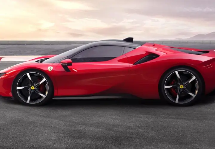 Czerwone Ferrari SF90 na torze. Marzysz o tym aucie? Sprawdź, jaka jest ferrari sf90 cena i zacznij planować zakup.