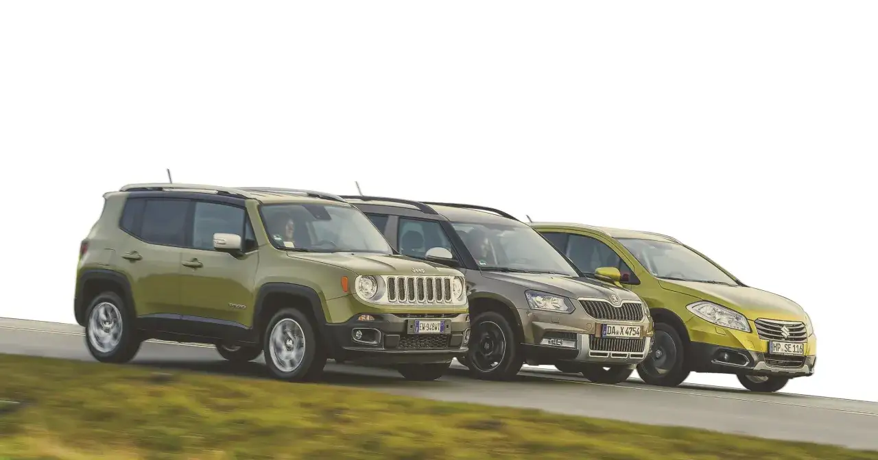 Zielony Jeep Renegade Hybrid na tle innych SUV-ów.